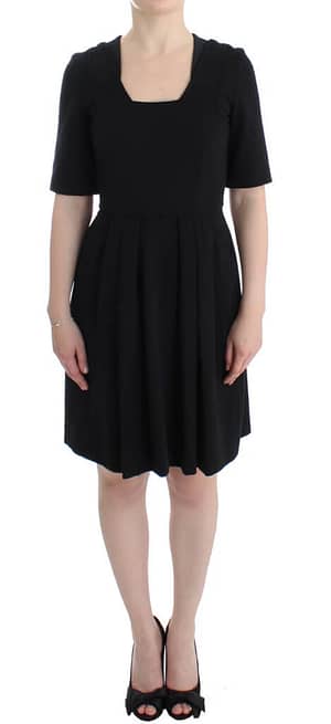 CO|TE Black short sleeve venus dress