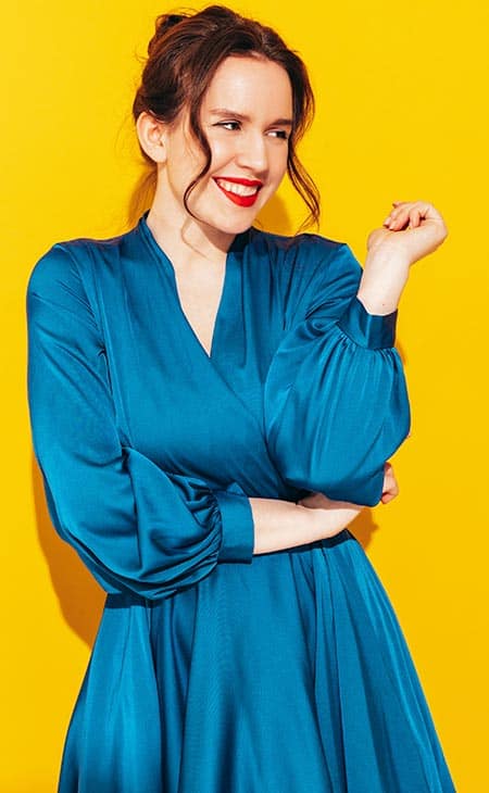 Woman smiling blue dress