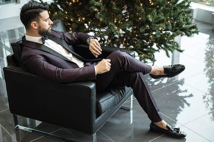 Elegant man suit sitting
