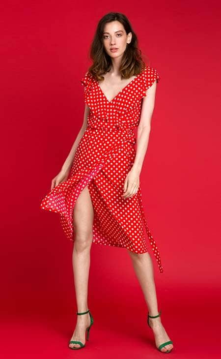 Woman posing dotted red dress