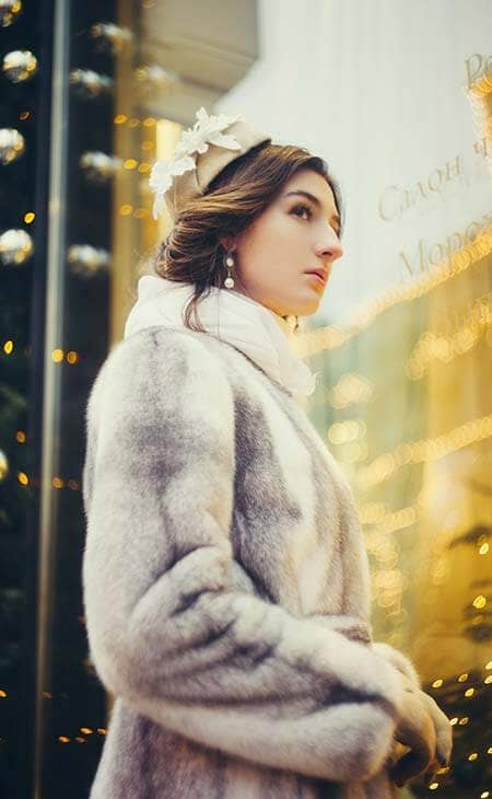 Elegant woman fur coat