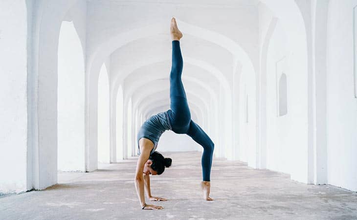 Woman doing yoga blue outfit