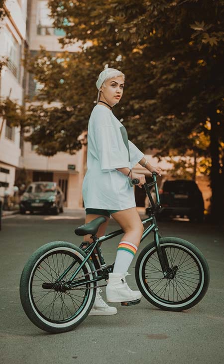 Woman bycicle oversized tshirt