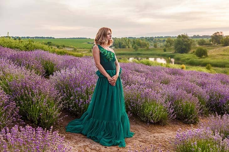 Woman green dress lavender field