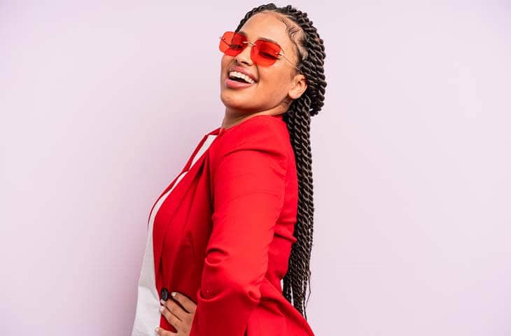 Woman red outfit sunglasses braids 1