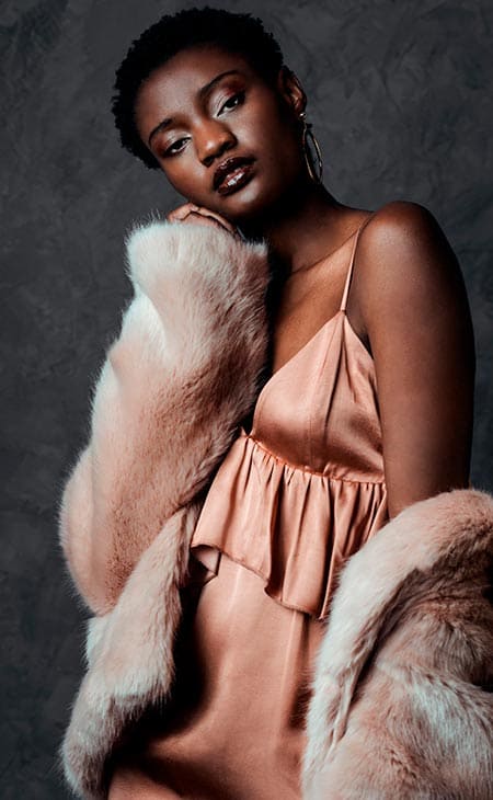 Woman elegant dress fur coat