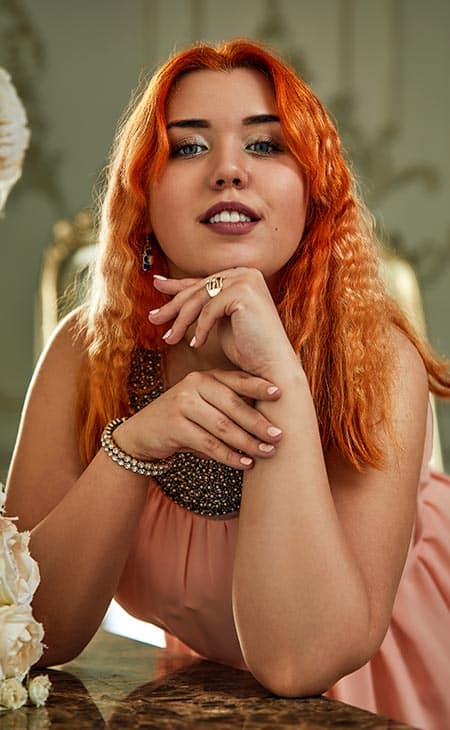 Woman posing looking camera jewelry