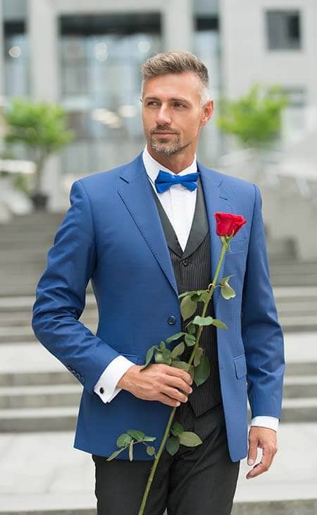 Man blue suit rose