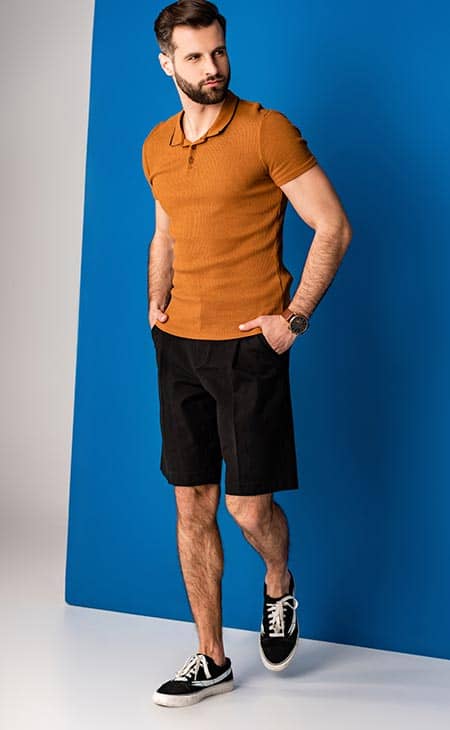 Man model posing shorts polo