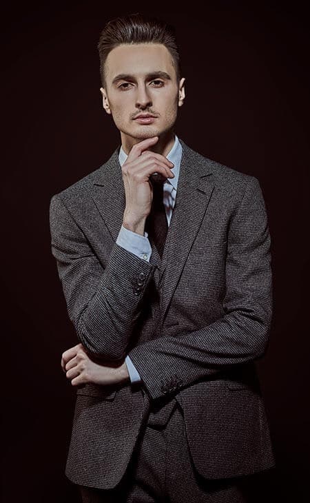 Portrait man tweed blazer elegant