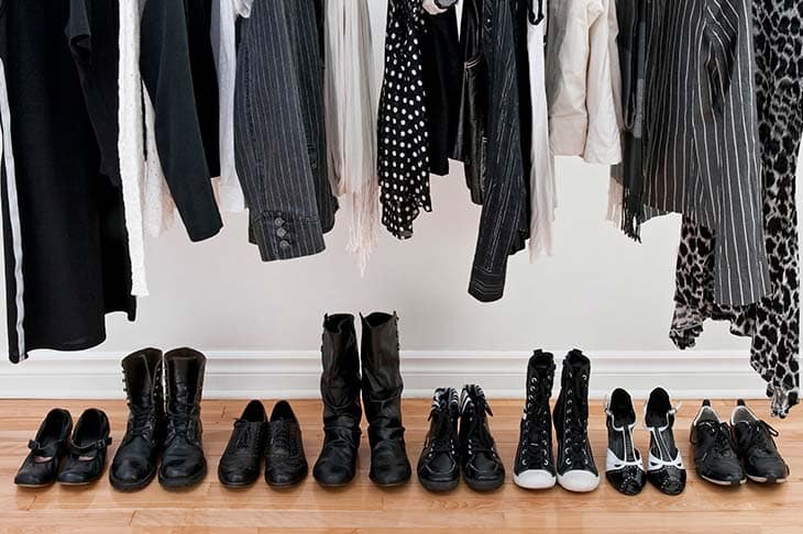Black white clothes shoes wooden floor