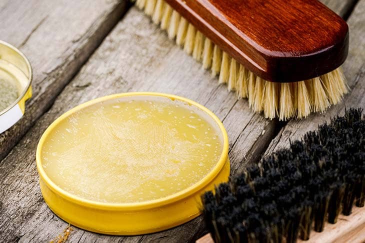 Brushes soap wax wooden table