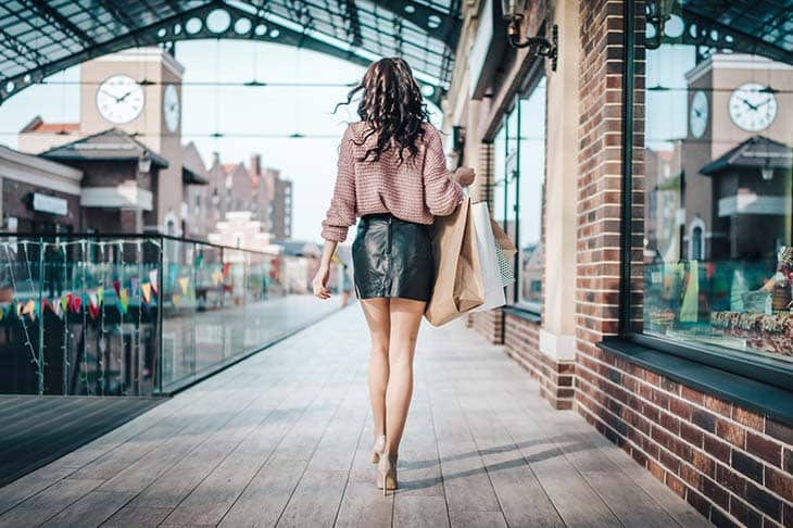 Woman skirt high heels shopping bags