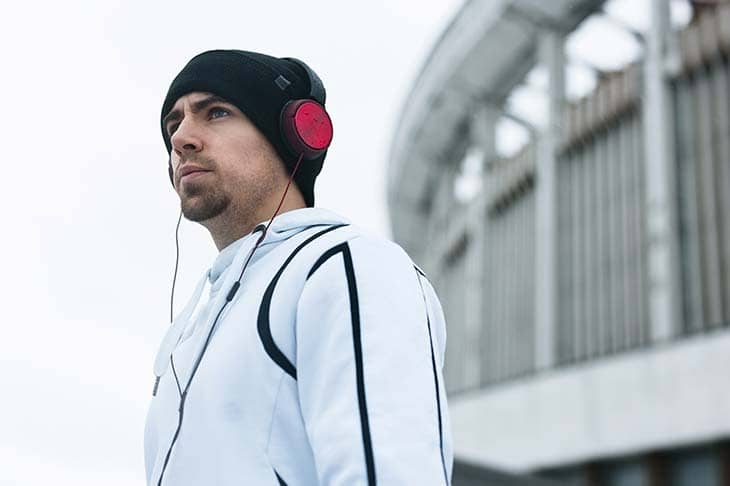 Man headphones outdoor training