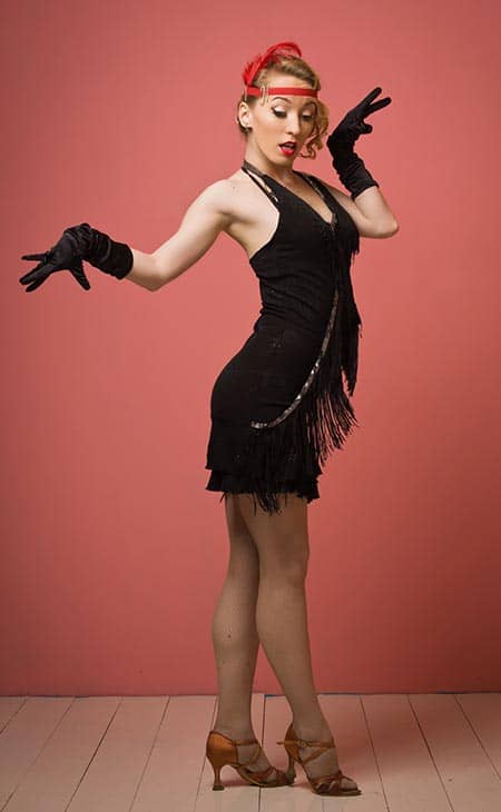 1920s lady dancing black dress