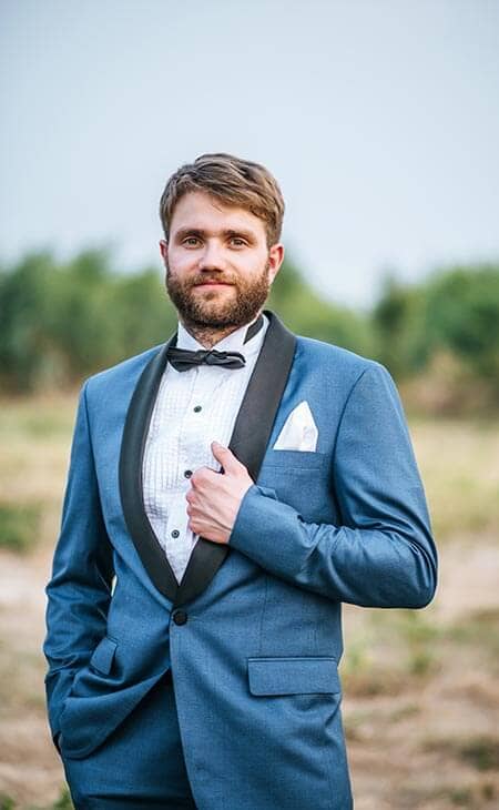 Man wedding suit posing park