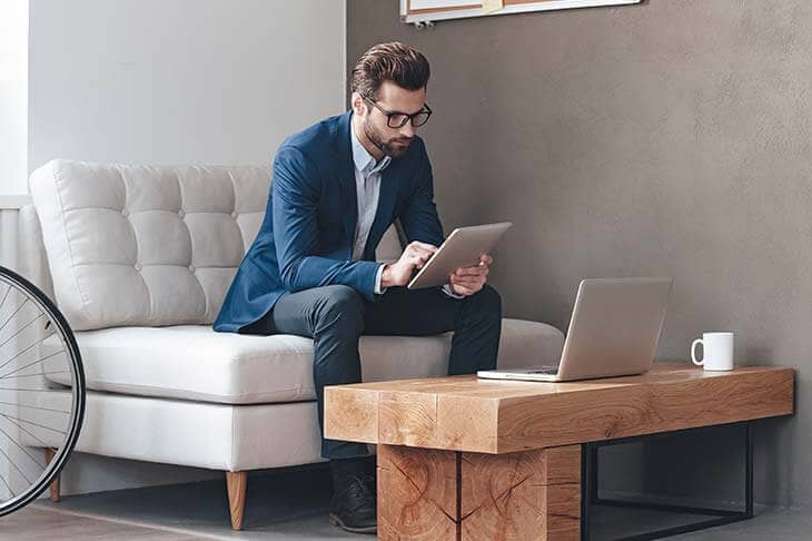 Entrepreneur using computer tablet