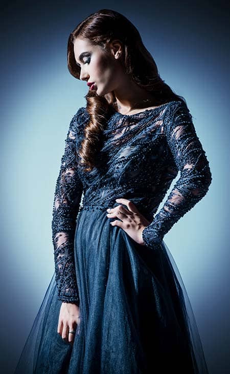 Woman posing blue dress